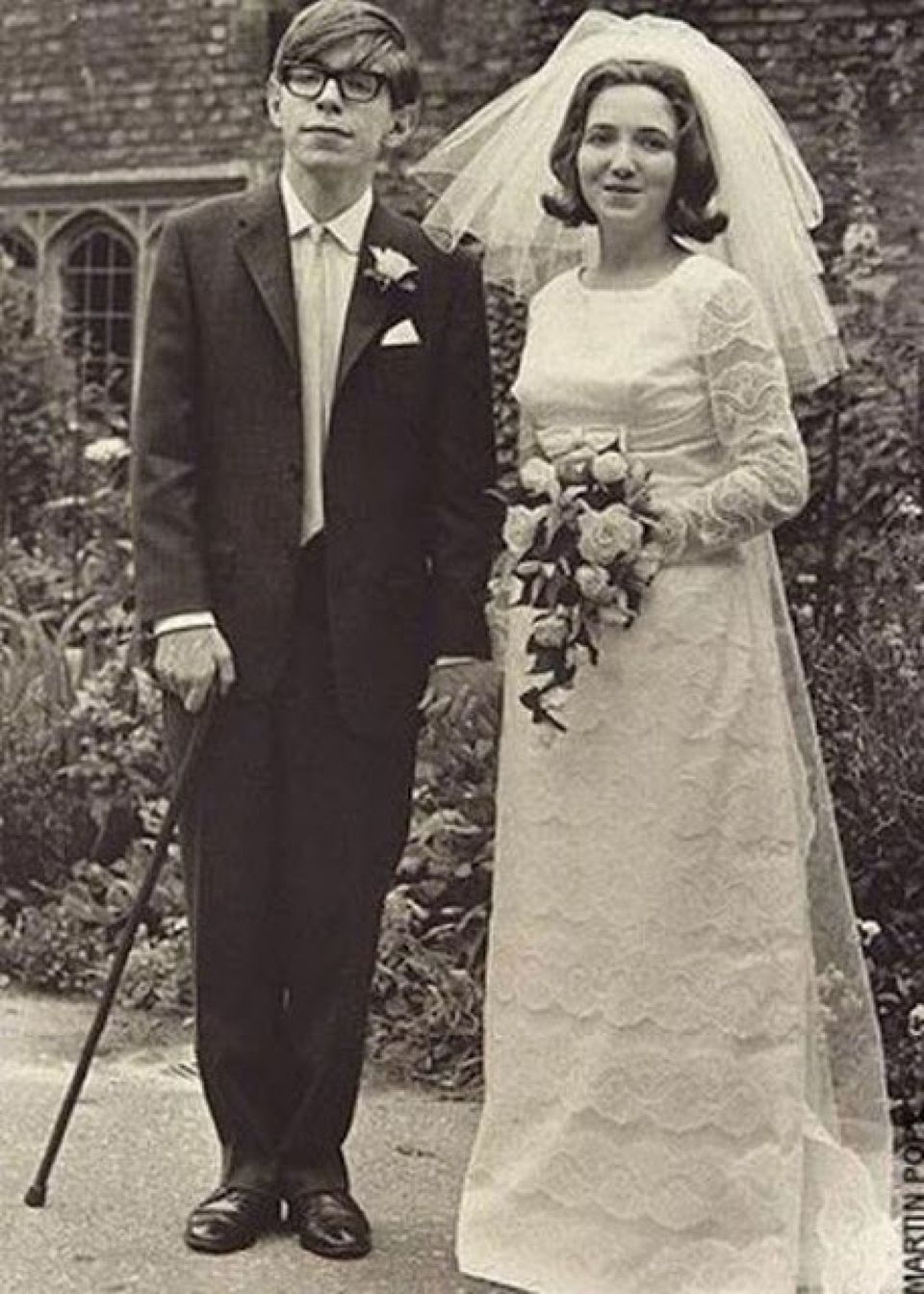 A Young, Cool Stephen Hawking Standing With His Bride