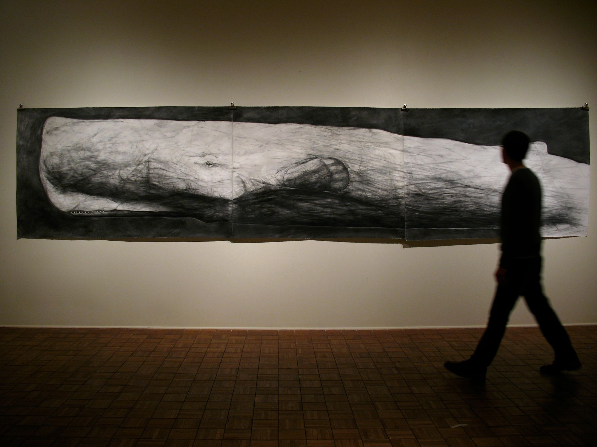 I Went In Bitterness, 2011  mixed media on paper  50 in. x 224 ¼ in.  Moby-Dick is drawn on a sheet of paper measuring over 18 feet long. The  drawing is then removed from the wall and rolled up, never to be seen  again.